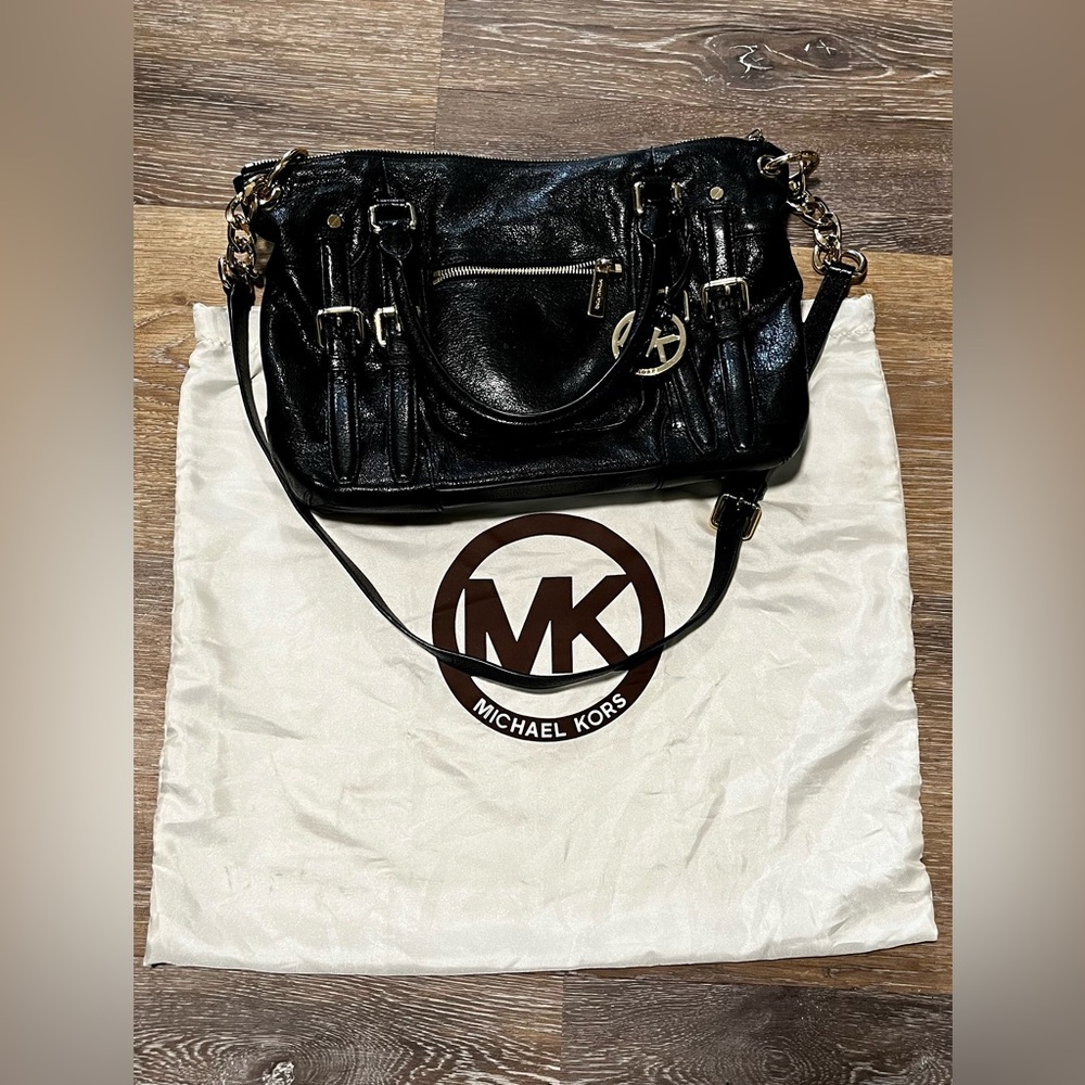 Michael Kors Black leather with gold hardware. OS